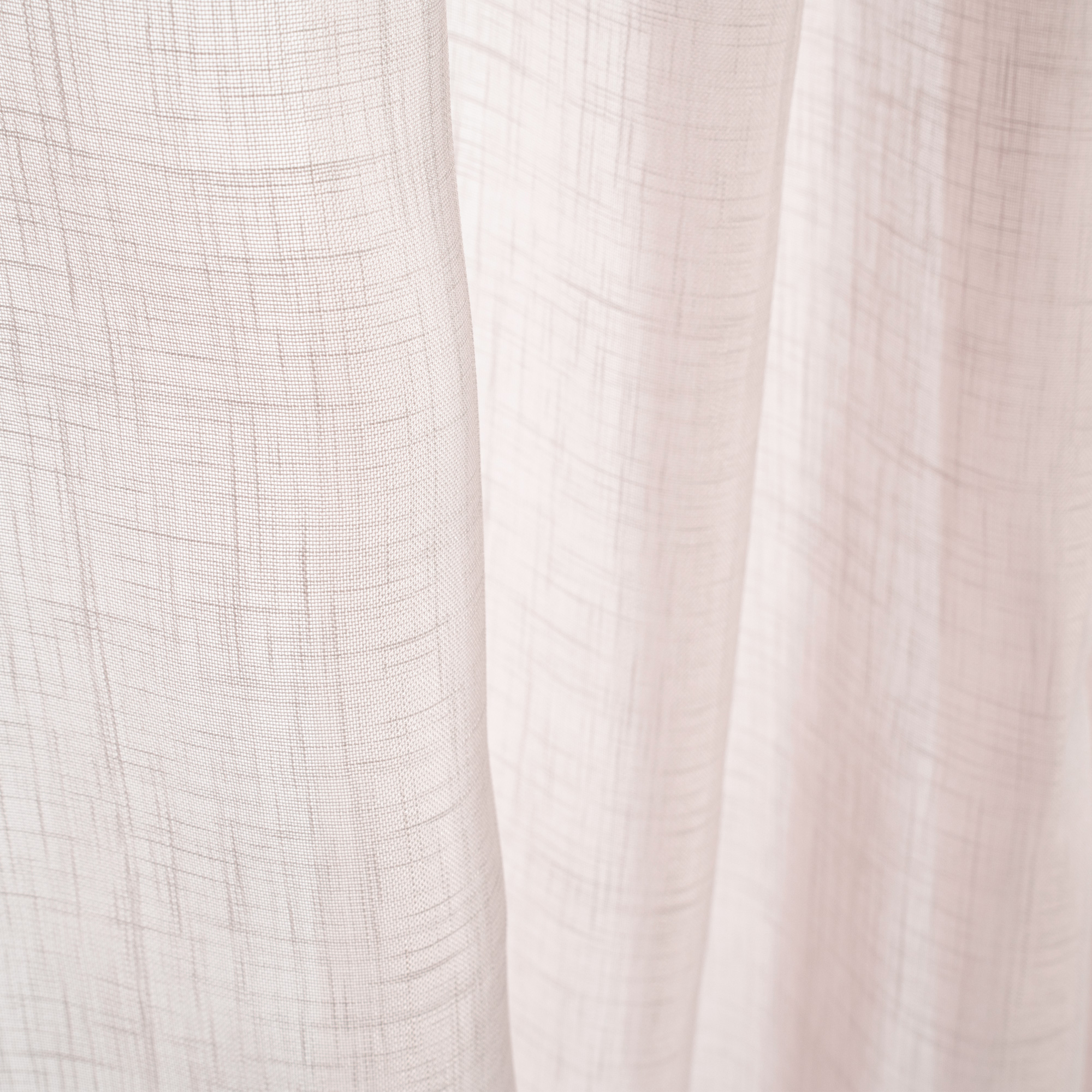 Tessuto strutturato con texture naturale e leggero drappeggio