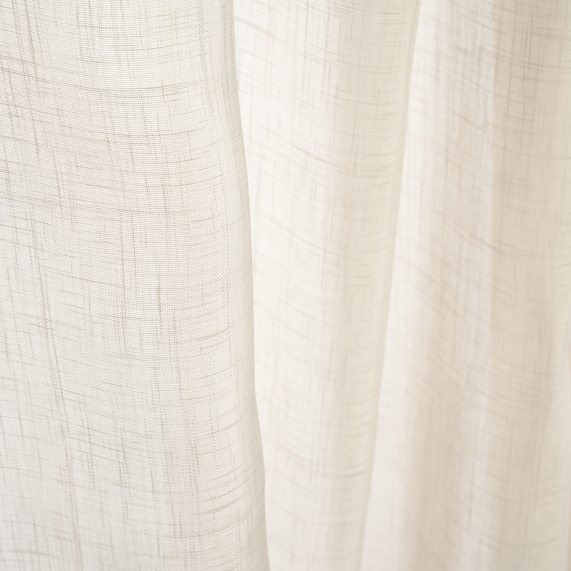 Tessuto strutturato con texture naturale e leggero drappeggio