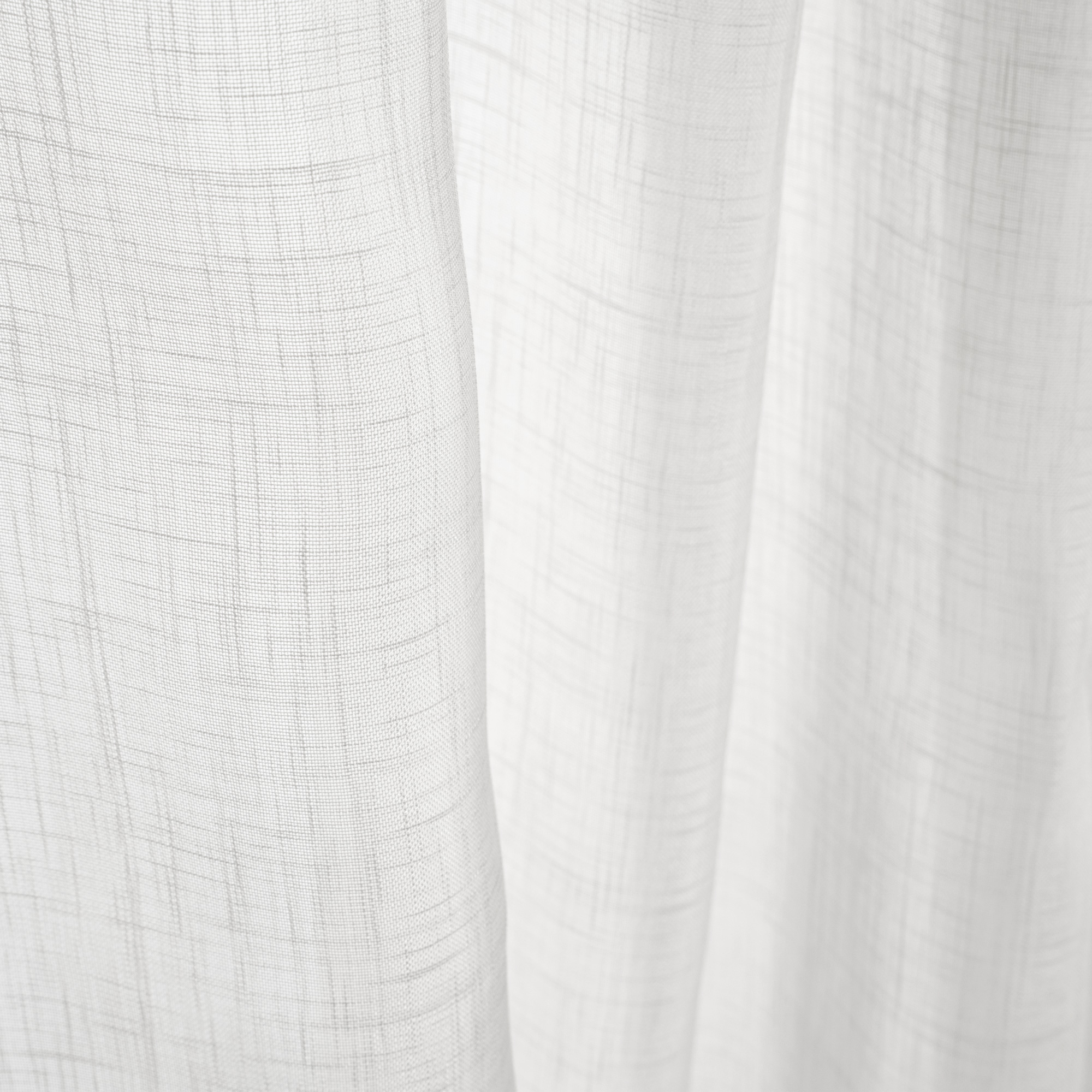 Tessuto strutturato con texture naturale e leggero drappeggio